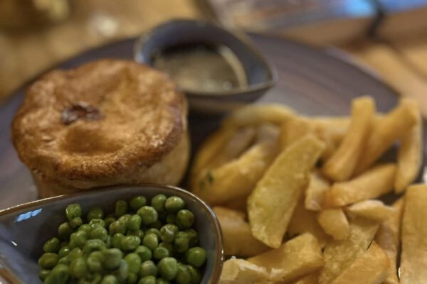 Pub meal with pie, chips and peas at The Horse and Jockey Bentley