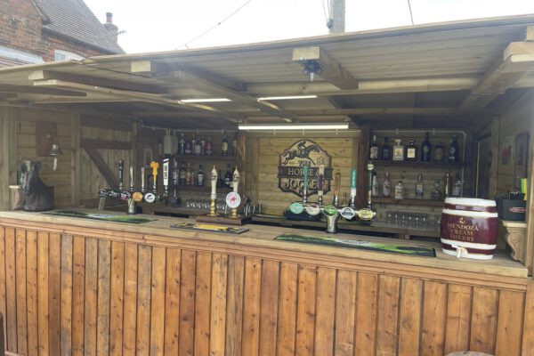Outdoor bar area in the beer garden at The Horse and Jockey Bentley