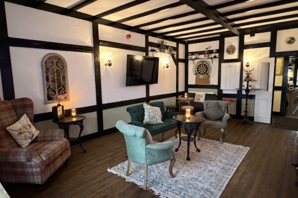 Relaxed seating area with armchairs at The Horse and Jockey Bentley