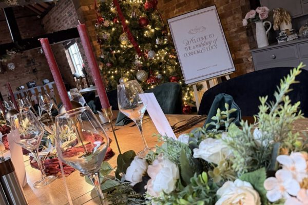 Private dining table detail with flowers and candles at The Horse and Jockey Bentley
