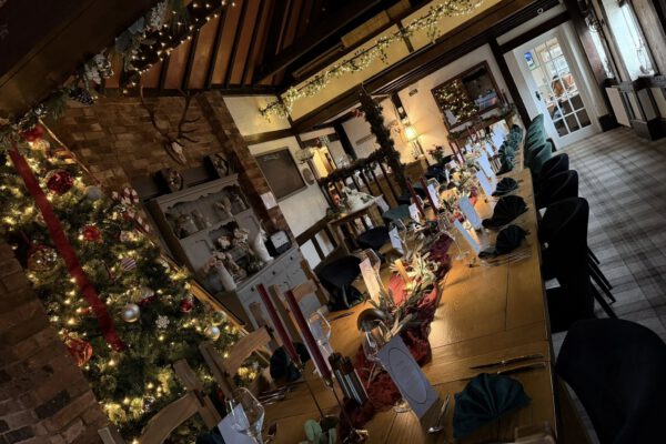 Festive private hire dining setup in the barn restaurant at The Horse and Jockey Bentley