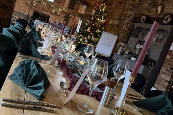 Barn restaurant dressed for a celebration at The Horse and Jockey Bentley