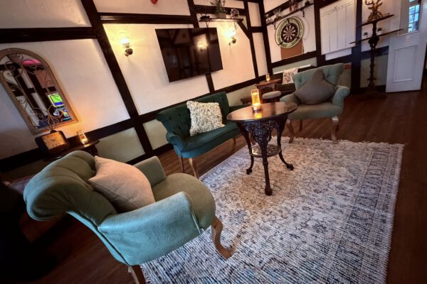 Armchair seating in the cosy lounge at The Horse and Jockey Bentley
