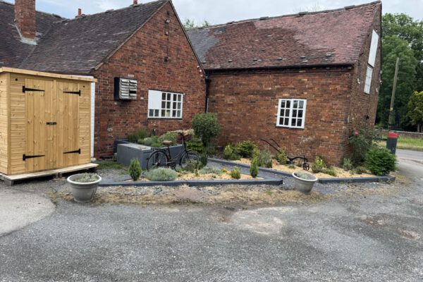 Historic brick outbuilding beside The Horse and Jockey Bentley