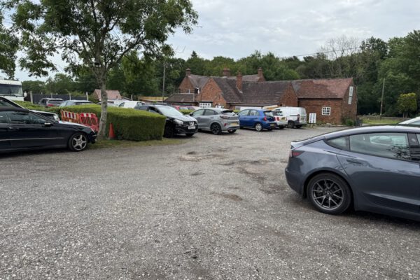 Car park and pub buildings at The Horse and Jockey Bentley