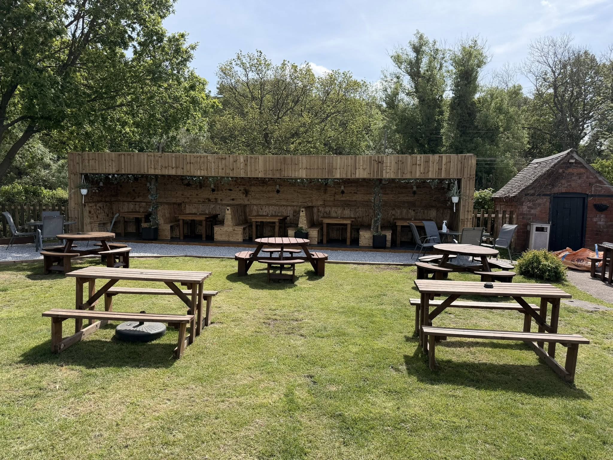 Beer garden with picnic tables at The Horse and Jockey Bentley